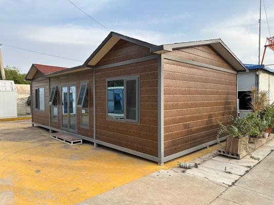Стальной изготовленный стабильный деревянный зерно Prefab Container House Flat Pack в нескольких размерах с дополнительными стенками и крышей сэндвич-панель