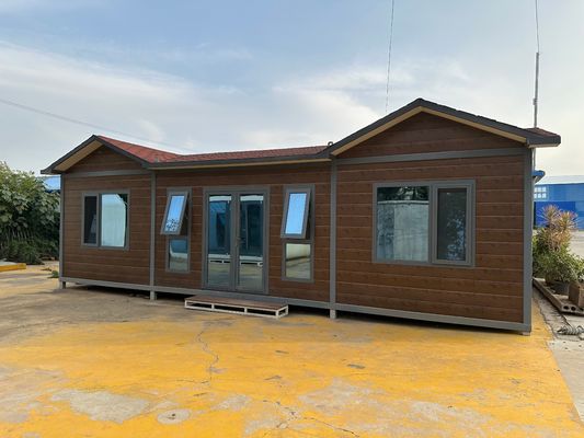 Стальной изготовленный стабильный деревянный зерно Prefab Container House Flat Pack в нескольких размерах с дополнительными стенками и крышей сэндвич-панель