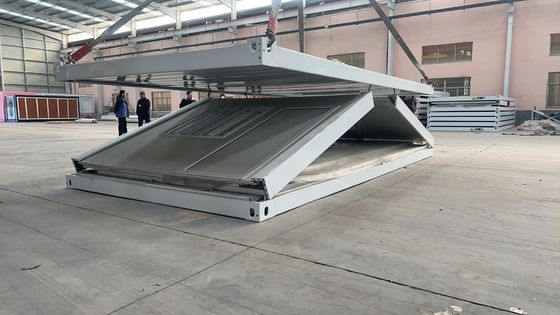 20ft 40ft Steel Frame Folding Container House с водонепроницаемым огнеупорным Rock Wool Sandwich Panel портативный и опциональный